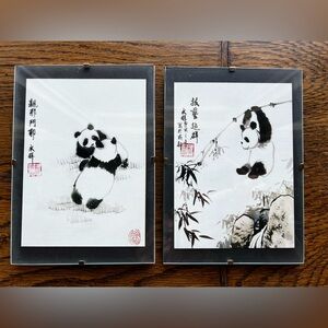 Pair of framed Panda prints